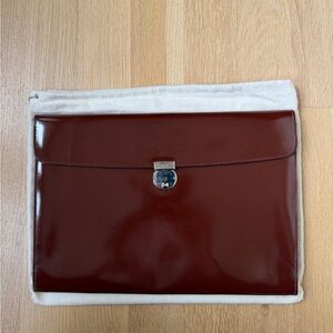 Gucci Bordeaux Patent Leather
Portfolio Clutch - Rare Color